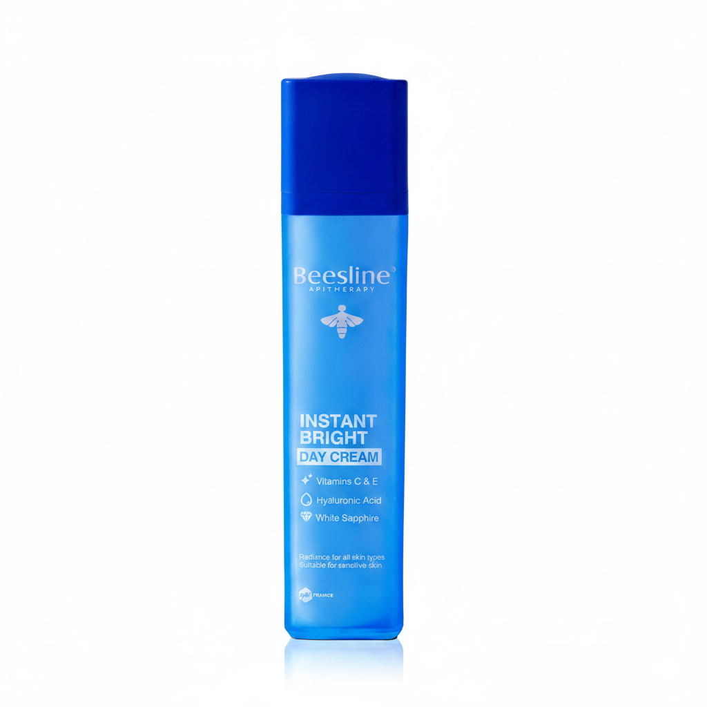 Beesline Instant Bright Day Cream 50ml with Vitamins C & E, Hyaluronic Acid, and White Sapphire for radiant hydrated skin.