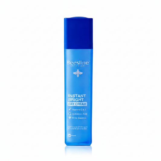 Beesline Instant Bright Day Cream 50ml with Vitamins C & E, Hyaluronic Acid, and White Sapphire for radiant hydrated skin.