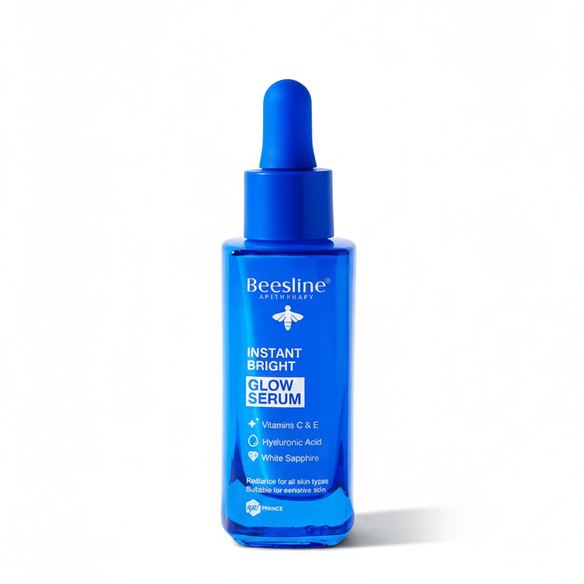 Beesline Instant Bright Glow Serum 30ml with Vitamins C & E, Hyaluronic Acid, and White Sapphire for radiant, hydrated skin.